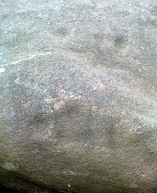 Cup-Marks on vertical face