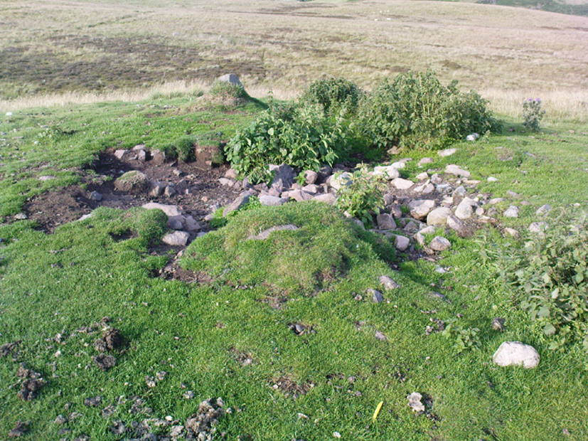Exposed section of cairn