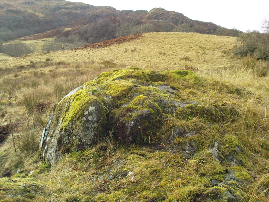 Cup-marked rocks of E.Corrycharmaig 3 (with the green hill of CE02 behind)